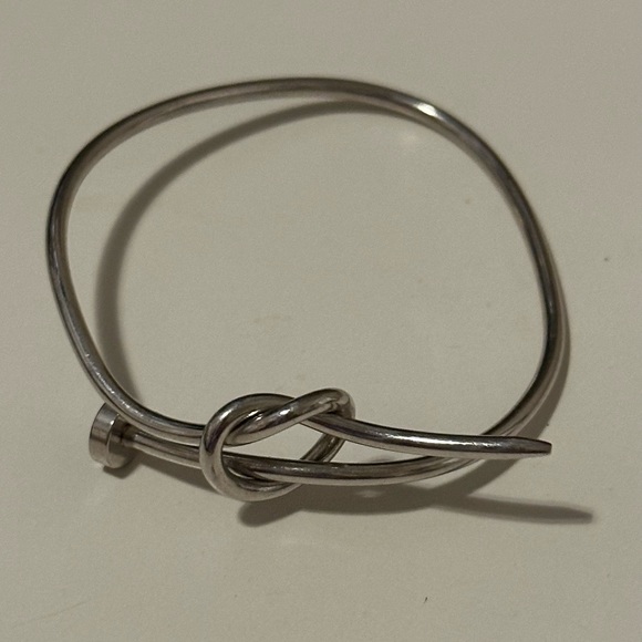 Silver Toned Knotted Nail Bracelet - Picture 1 of 4